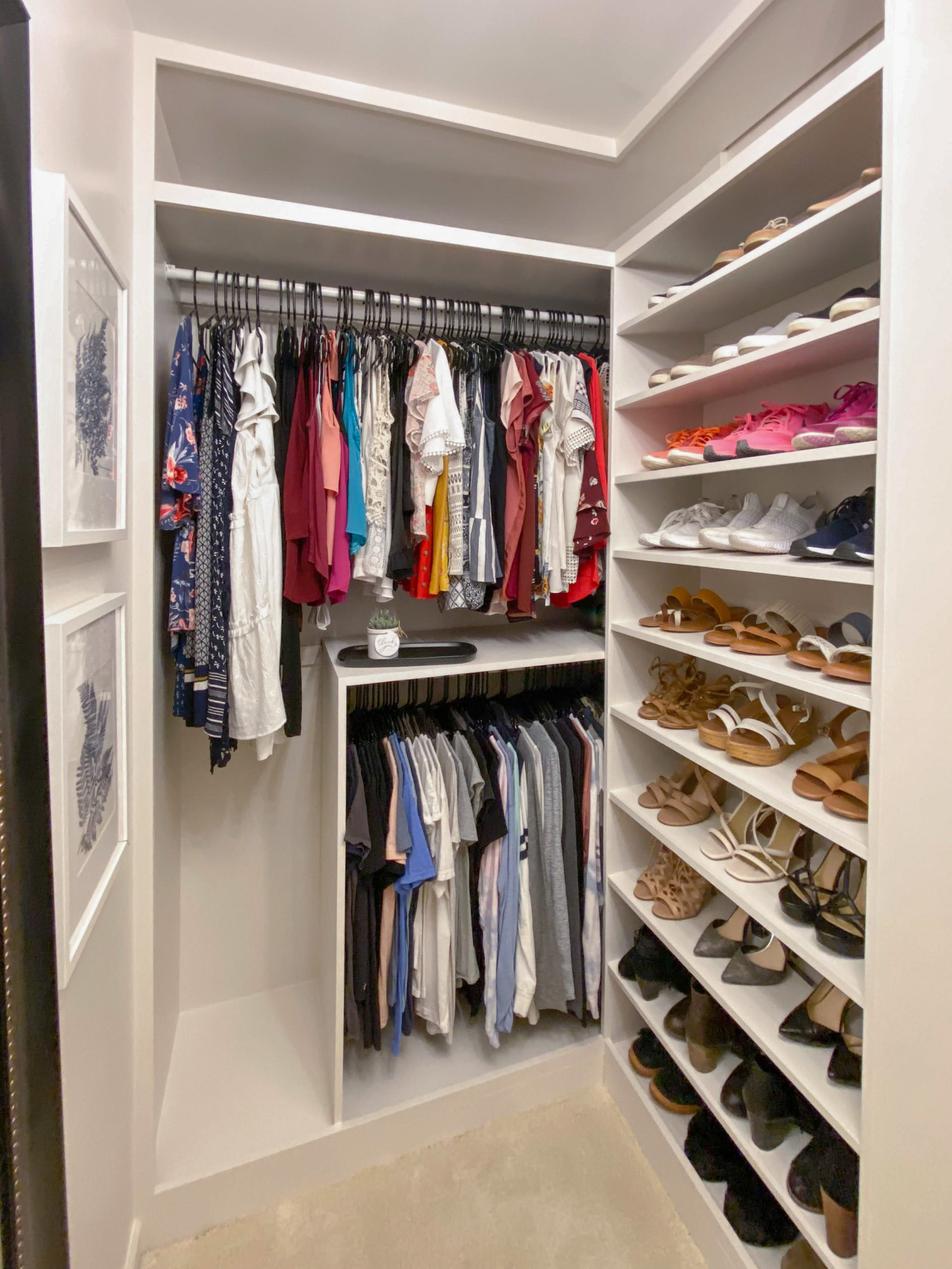Custom Closet white Built Ins with tall shoe storage.