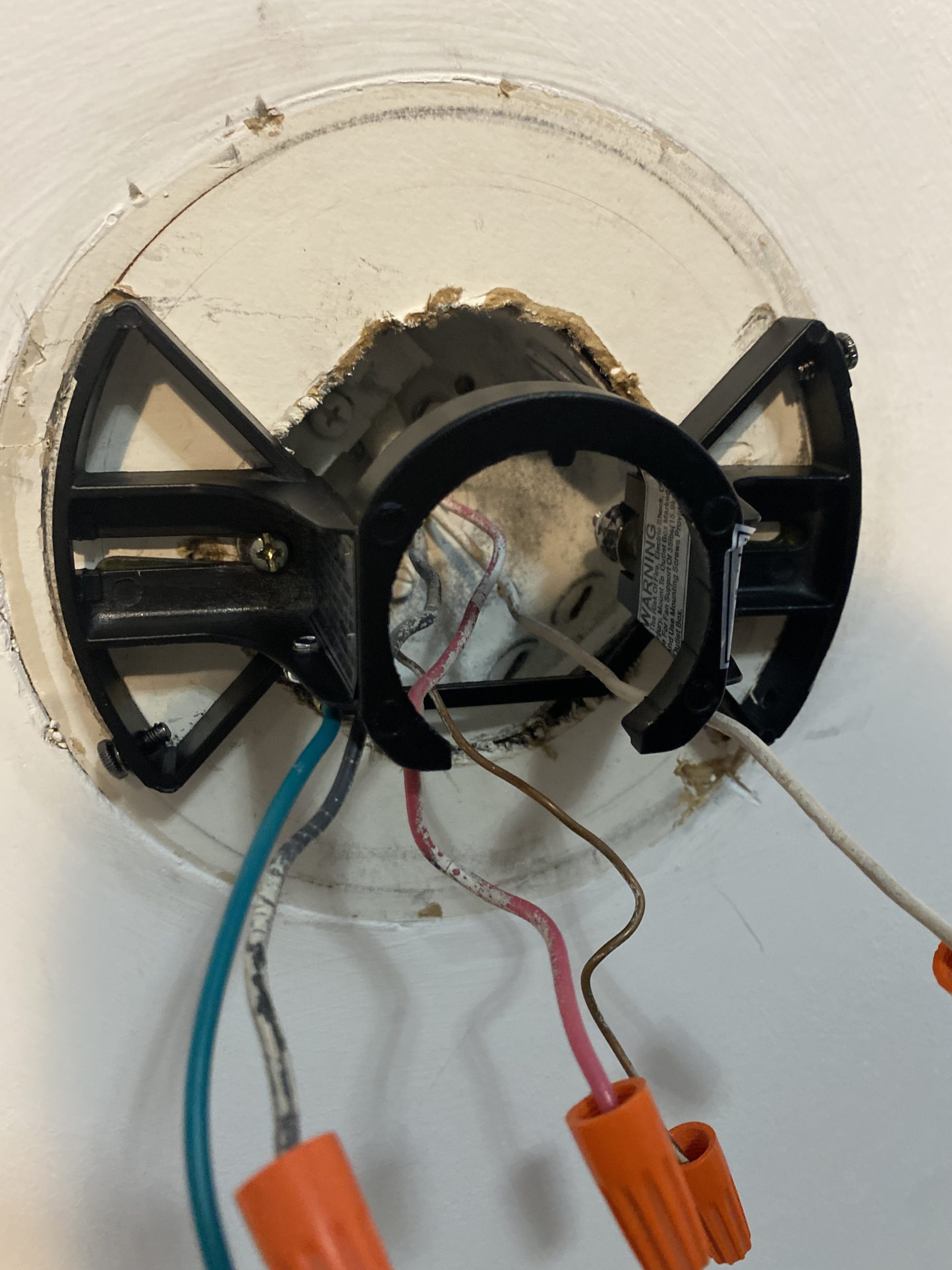 Ceiling Electrical Box that supports a ceiling fan on two wall switches.
